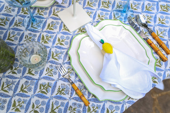Outdoor table set with a purple block printed tablecloth