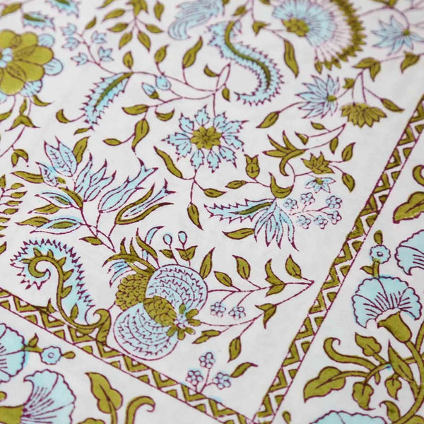 Sea Holly Tablecloth | Our Sea Holly print is an ode to a traditional Indian block pattern, updated in a fresh and sophisticated color palette. Tranquil blue intertwined with olive green is reminiscent of mediterranean shores, wild rosemary and rocky beac