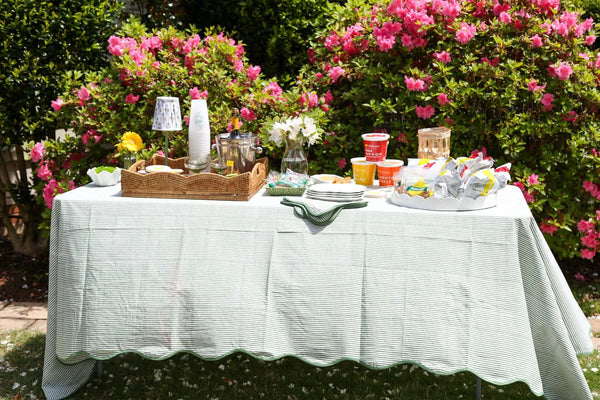 Harbor Stripe Scalloped Tablecloth | Add charm to your card table with this lightweight block print tablecloth, featuring a botanical pattern and piped scalloped border for a polished look.