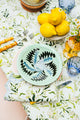 Inslee Claiborne Napkins, Set of 4 | From our Inslee Fariss collab, the Claiborne block print napkins feature blue blossoms and vines on crisp white linen—elegant, effortless, and summer-ready.