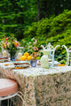 Inslee Claiborne Linen Tablecloth | The Claiborne linen block print tablecloth features Inslee Fariss’s hand-painted blue blossoms and vines on crisp white—effortless, elegant, and summer-ready.