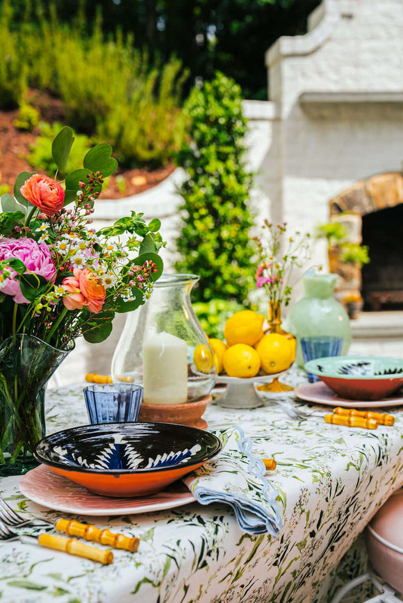 Inslee Claiborne Linen Tablecloth | The Claiborne linen block print tablecloth features Inslee Fariss’s hand-painted blue blossoms and vines on crisp white—effortless, elegant, and summer-ready.