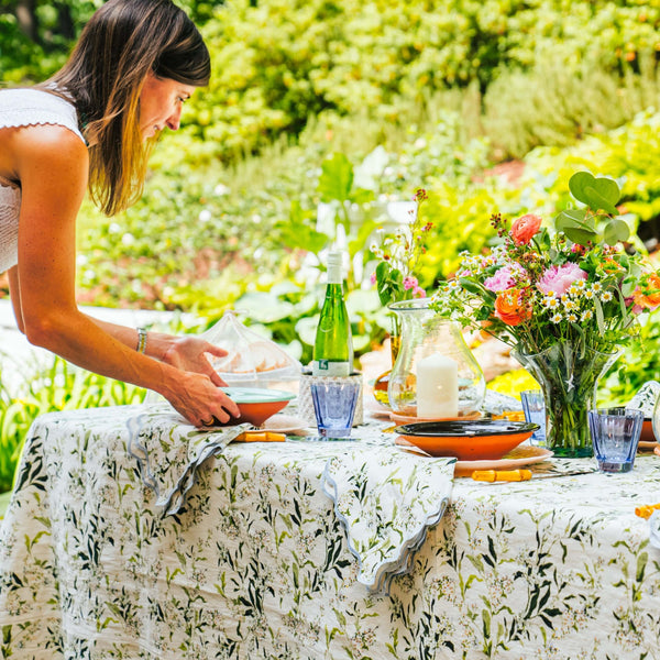 Inslee Claiborne Linen Tablecloth | The Claiborne linen block print tablecloth features Inslee Fariss’s hand-painted blue blossoms and vines on crisp white—effortless, elegant, and summer-ready.