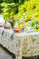Inslee Claiborne Linen Tablecloth | The Claiborne linen block print tablecloth features Inslee Fariss’s hand-painted blue blossoms and vines on crisp white—effortless, elegant, and summer-ready.