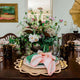 Table set with pink striped napkin