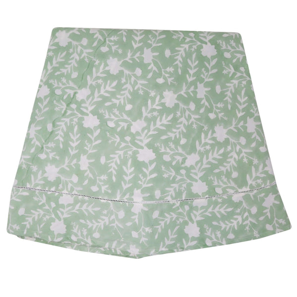 Camellia Tablecloth | Our Camellia print is a crowd-pleasing, grounded base upon which you can build any table scheme. With a calming ocean blue background and contrasting pale blue outlines, this tangle of vines adds sophistication and season-less warmth