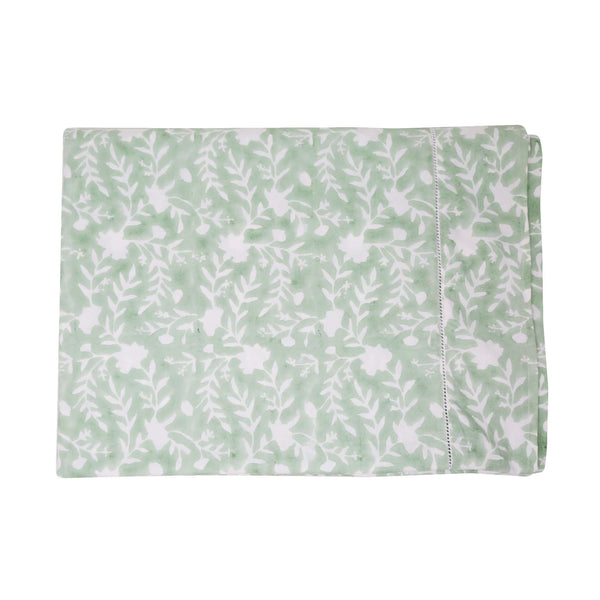 Camellia Tablecloth | Our Camellia print is a crowd-pleasing, grounded base upon which you can build any table scheme. With a calming ocean blue background and contrasting pale blue outlines, this tangle of vines adds sophistication and season-less warmth