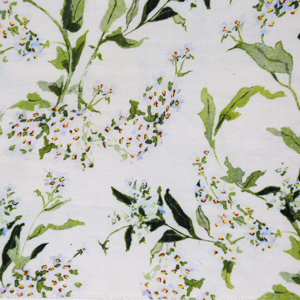 Inslee Claiborne Napkins, Set of 4 | From our Inslee Fariss collab, the Claiborne block print napkins feature blue blossoms and vines on crisp white linen—elegant, effortless, and summer-ready.
