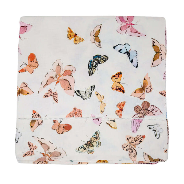 Inslee Celine Linen Tablecloth | This linen block print tablecloth features Inslee Fariss’s watercolor butterflies on crisp white—an airy, elegant choice for gatherings that feel special.
