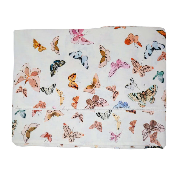 Inslee Celine Linen Tablecloth | This linen block print tablecloth features Inslee Fariss’s watercolor butterflies on crisp white—an airy, elegant choice for gatherings that feel special.