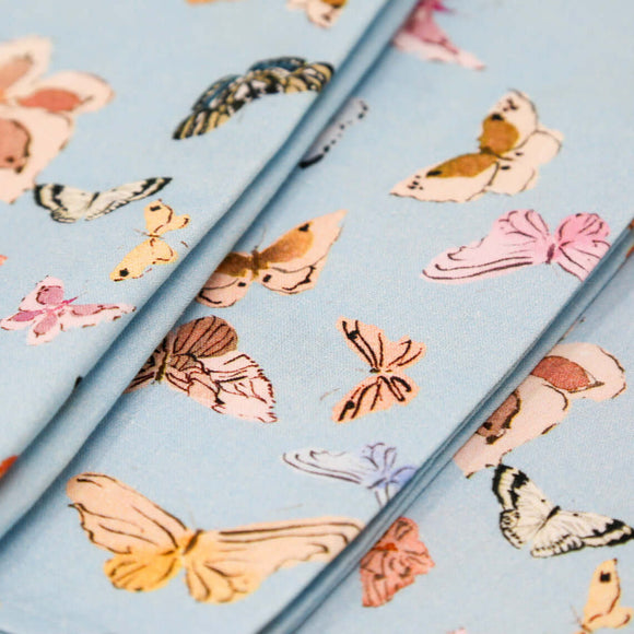 Inslee Persephone Napkins, Set of 4 | From our Inslee Fariss collab, Persephone block print napkins feature delicate butterflies on airy blue—elegant, cheerful, and perfect for any special table.
