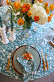 Camellia Tablecloth | Our Camellia print is a crowd-pleasing, grounded base upon which you can build any table scheme. With a calming ocean blue background and contrasting pale blue outlines, this tangle of vines adds sophistication and season-less warmth