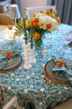 Camellia Tablecloth | Our Camellia print is a crowd-pleasing, grounded base upon which you can build any table scheme. With a calming ocean blue background and contrasting pale blue outlines, this tangle of vines adds sophistication and season-less warmth