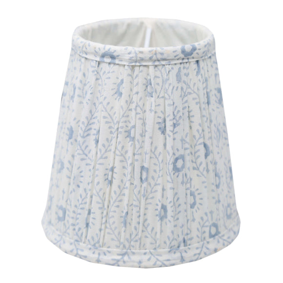 Caliza Sconce Shade | Need an instant room upgrade? Our hand-printed, hand pleated lampshades bring a soft glow and touch of patterned interest to any living space. Plain shades be gone! How many can we have in one room? Empire style with clip fitting for