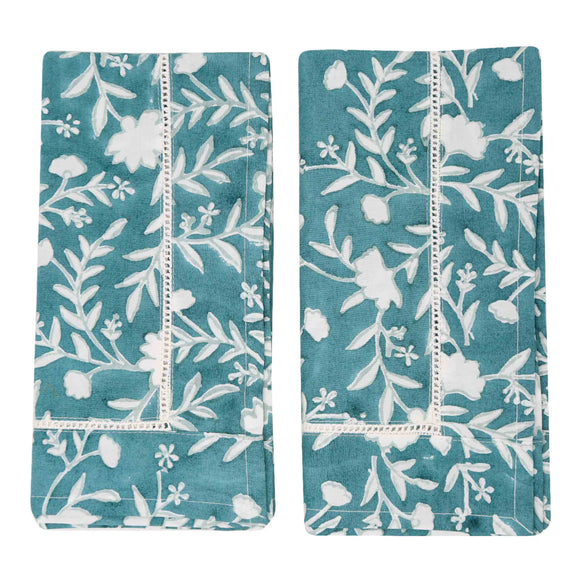 Camellia Napkins, Set of 4 | Our Camellia print is a crowd-pleasing, grounded base upon which you can build any table scheme. With a calming ocean blue background and contrasting pale blue outlines, this tangle of vines adds sophistication and seasonless