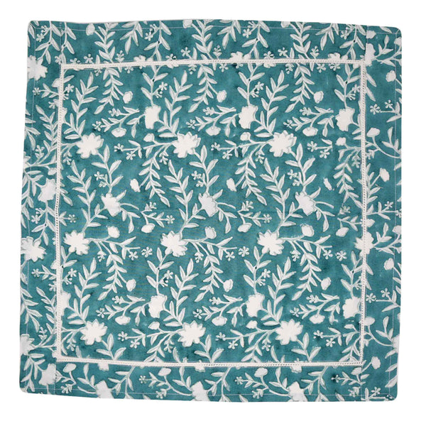 Camellia Napkins, Set of 4 | Our Camellia print is a crowd-pleasing, grounded base upon which you can build any table scheme. With a calming ocean blue background and contrasting pale blue outlines, this tangle of vines adds sophistication and seasonless