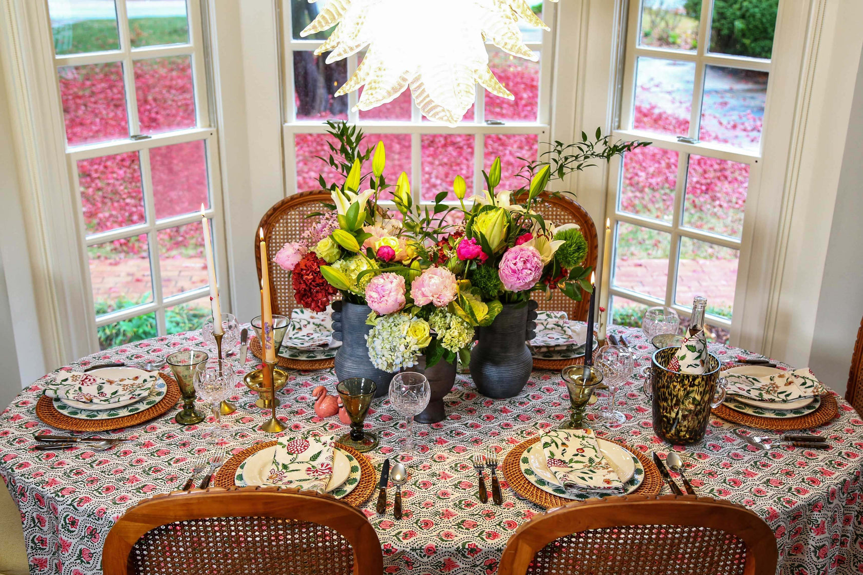 pink block printed tablecloth with floral centerpiece