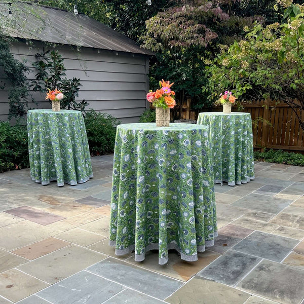 Green block printed tablecloth on cocktail table