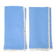 Blue linen cloth napkins with a white decorative edge