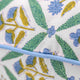 Green and blue block printed pillow cover with blue piping