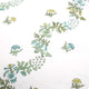 Close up of white and green block printed pillow cover