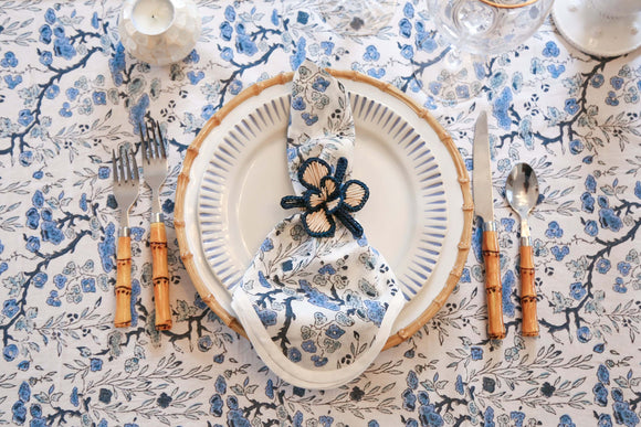 Place setting on blue and white block printed tablecloth