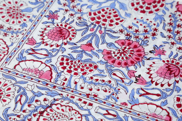 Pink and blue block printed tablecloth pattern