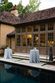 Cocktail tables outside with blue block printed tablecloth