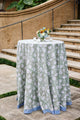 Cocktail table outside with blue block printed tablecloth