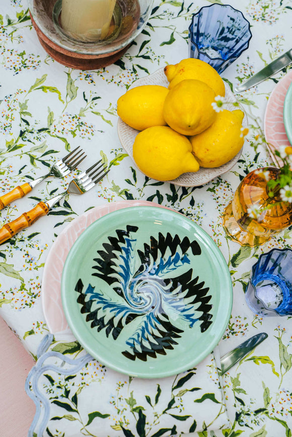 Inslee Claiborne Linen Tablecloth | The Claiborne linen block print tablecloth features Inslee Fariss’s hand-painted blue blossoms and vines on crisp white—effortless, elegant, and summer-ready.
