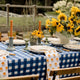 Blue block printed gingham rectangle tablecloth with sunflowers