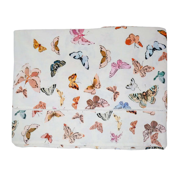Inslee Celine Linen Tablecloth | This linen block print tablecloth features Inslee Fariss’s watercolor butterflies on crisp white—an airy, elegant choice for gatherings that feel special.