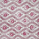 Close up of red block printed swimsuit cover up fabric