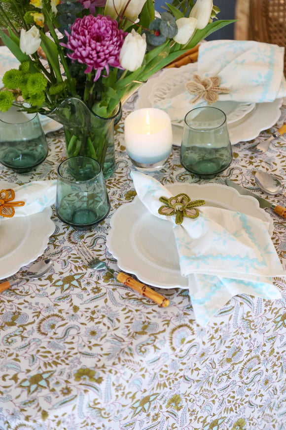 Sea Holly Tablecloth | Our Sea Holly print is an ode to a traditional Indian block pattern, updated in a fresh and sophisticated color palette. Tranquil blue intertwined with olive green is reminiscent of mediterranean shores, wild rosemary and rocky beac