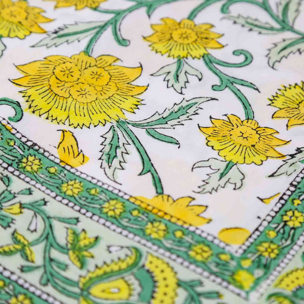 Close up of yellow floral block printed fabric
