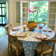 Dining room table set with blue block printed tablecloth