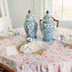 Table setting with pink and blue block printed tablecloth