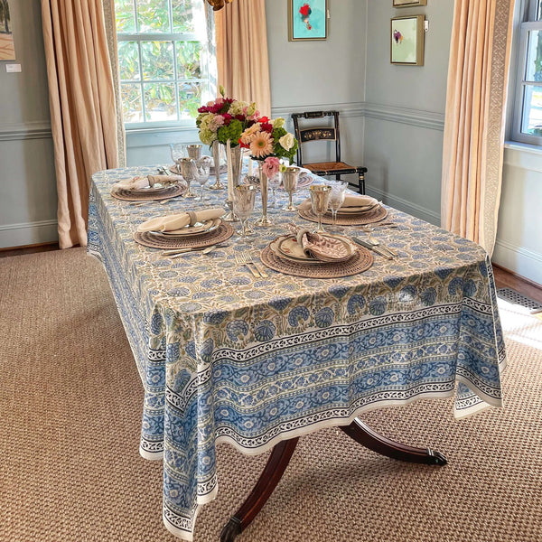 Dining table set with blue floral block printed tablecloth