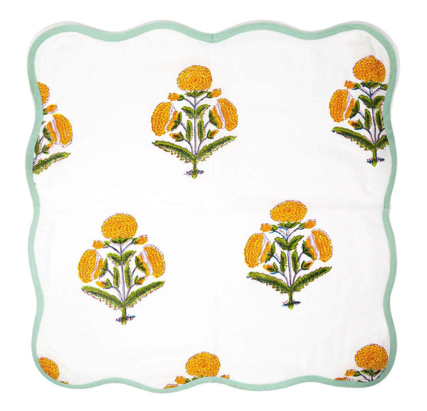 Yellow and white block printed cotton napkin with green trim