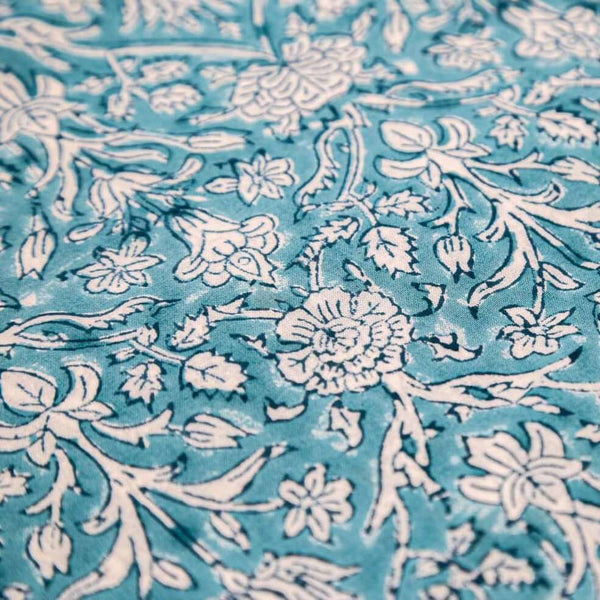 Close up of blue block printed fabric