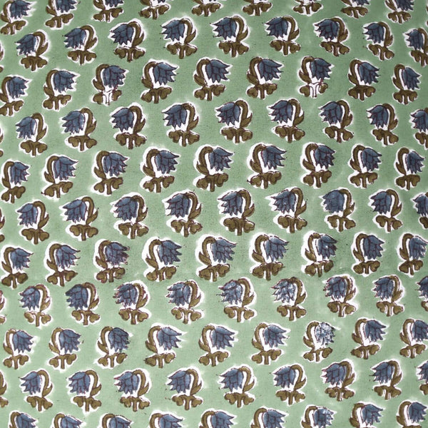 Close up of green block printed pillow cover pattern