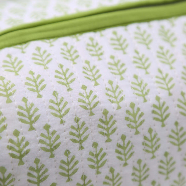 Close up of green and white toiletry bag
