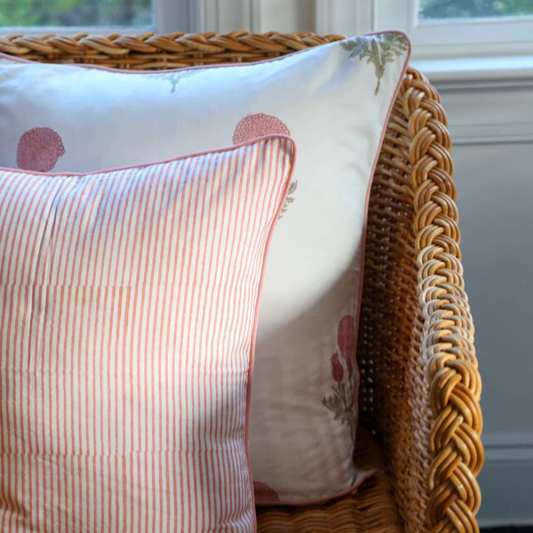 Pink striped block printed pillowcase on chair