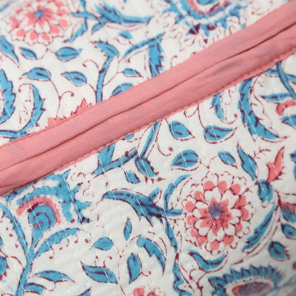 Close up of blue and pink toiletry bag