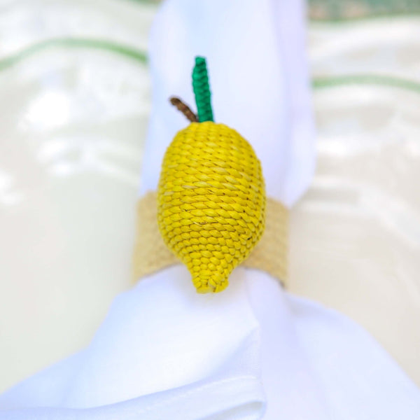 White napkin with yellow lemon woven napkin ring