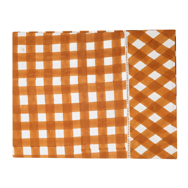 Orange and white gingham tablecloth